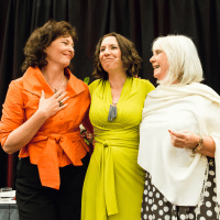 Annie Stoker, Joanna Martin and Susie Heath holding each other in an embrace.